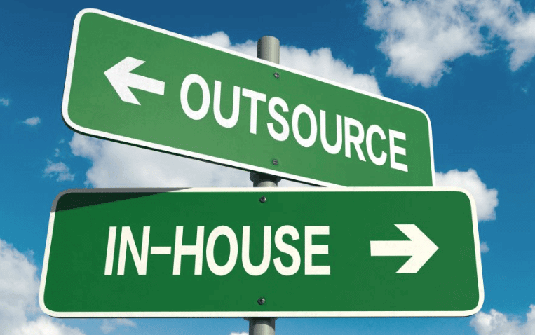 B2B lead generation specialists reviewing pipeline dashboard to boost sales during downturn