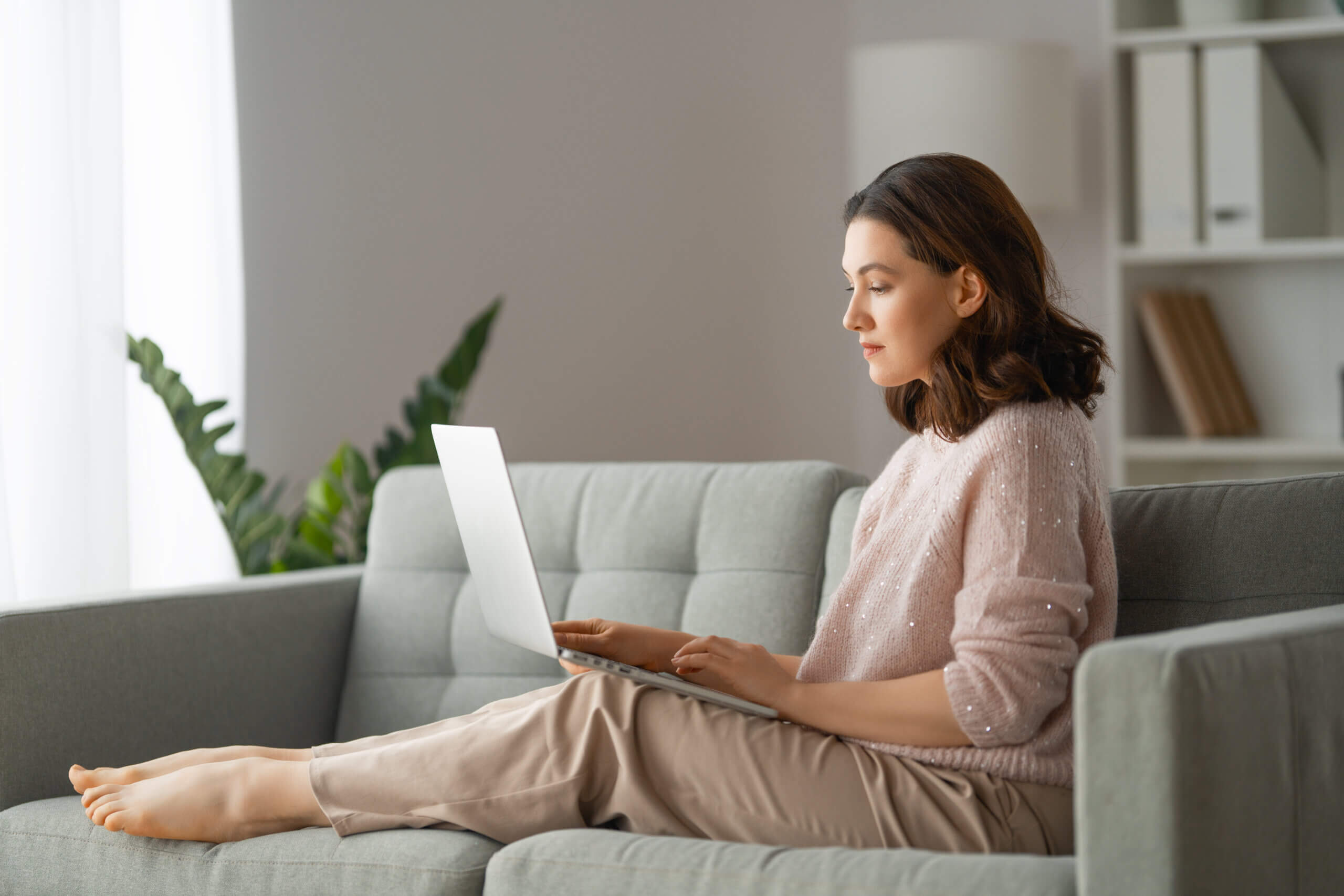 B2B marketer reviewing email marketing campaigns that get read on laptop analytics dashboard
