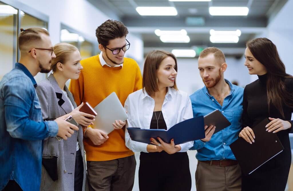B2B team mapping lead generation process steps on whiteboard for multi-channel outreach