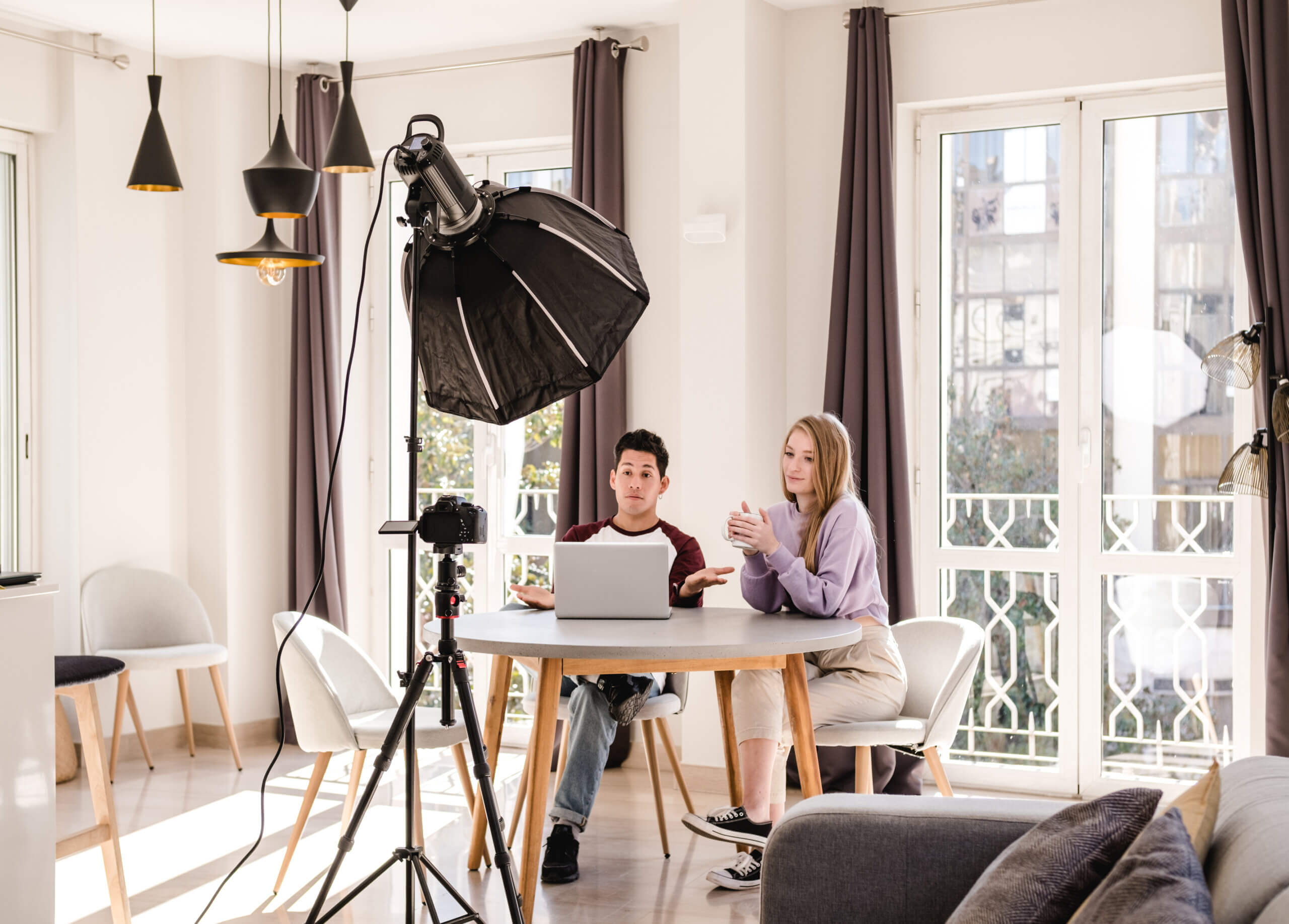 B2B sales team planning YouTube for local lead generation strategy on laptop dashboard