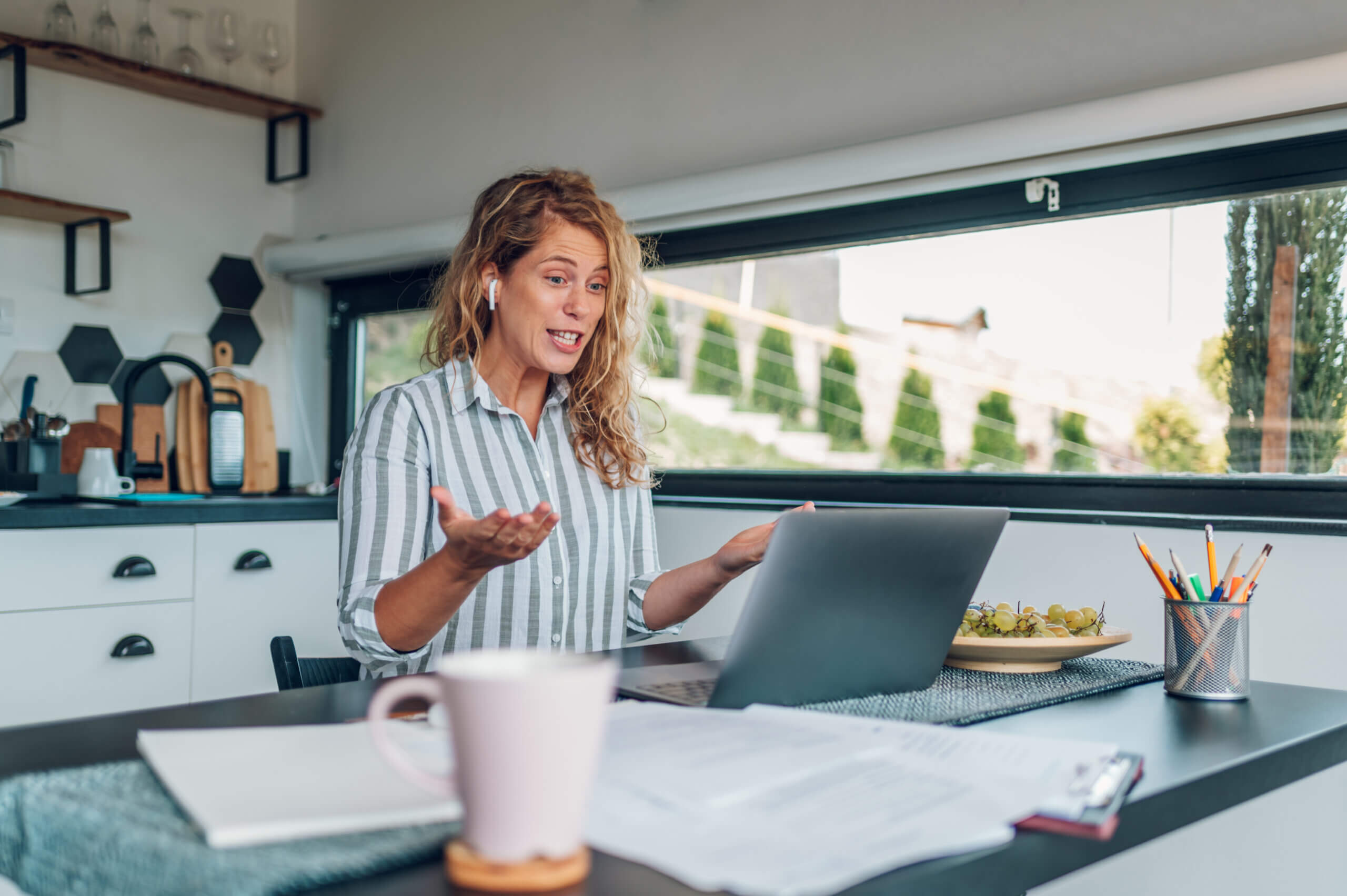B2B sales rep reviewing call metrics dashboard with cold calling tips for 2025